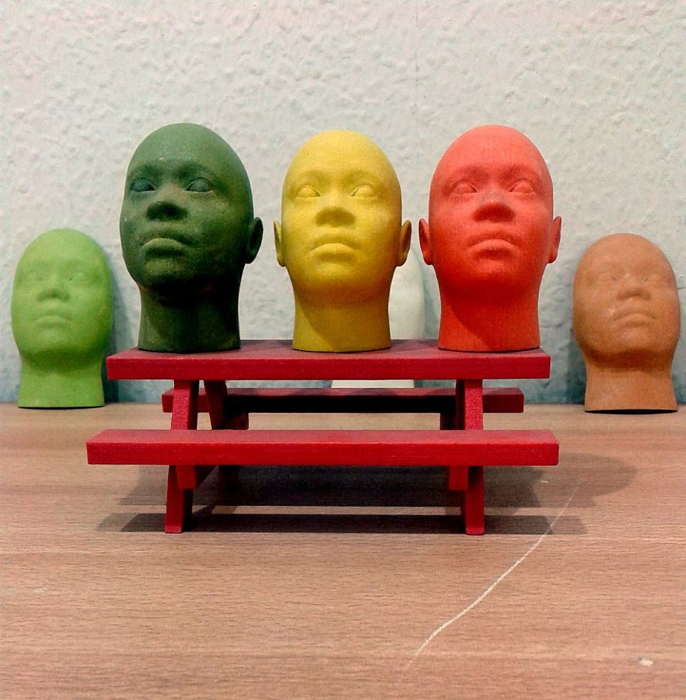 Full colour miniature face models produced on a 3D Printer. Photo: Creative Commons/S zillayali